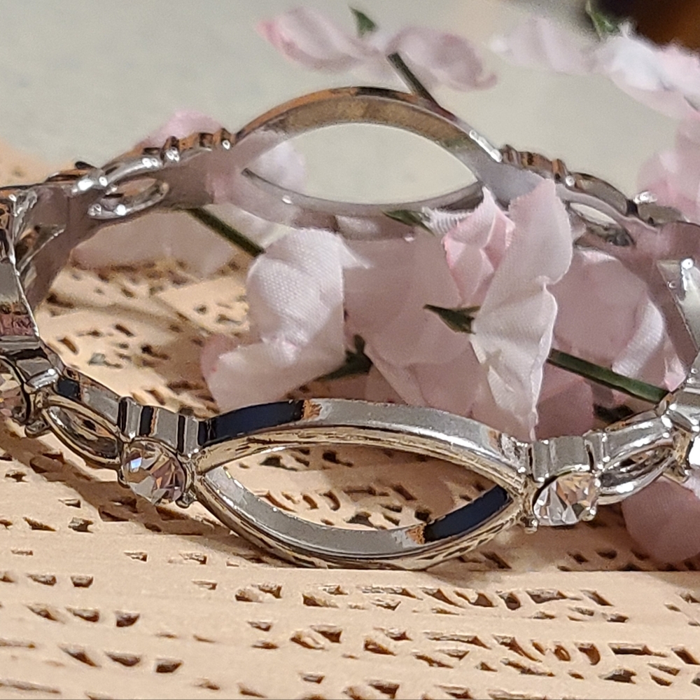 Spring loaded Bracelet silver for sale today